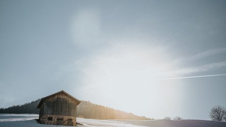 Immagini che emozionano: appartamenti Presulis a Fiè Casa di legno su campo innevato in una giornata invernale di sole